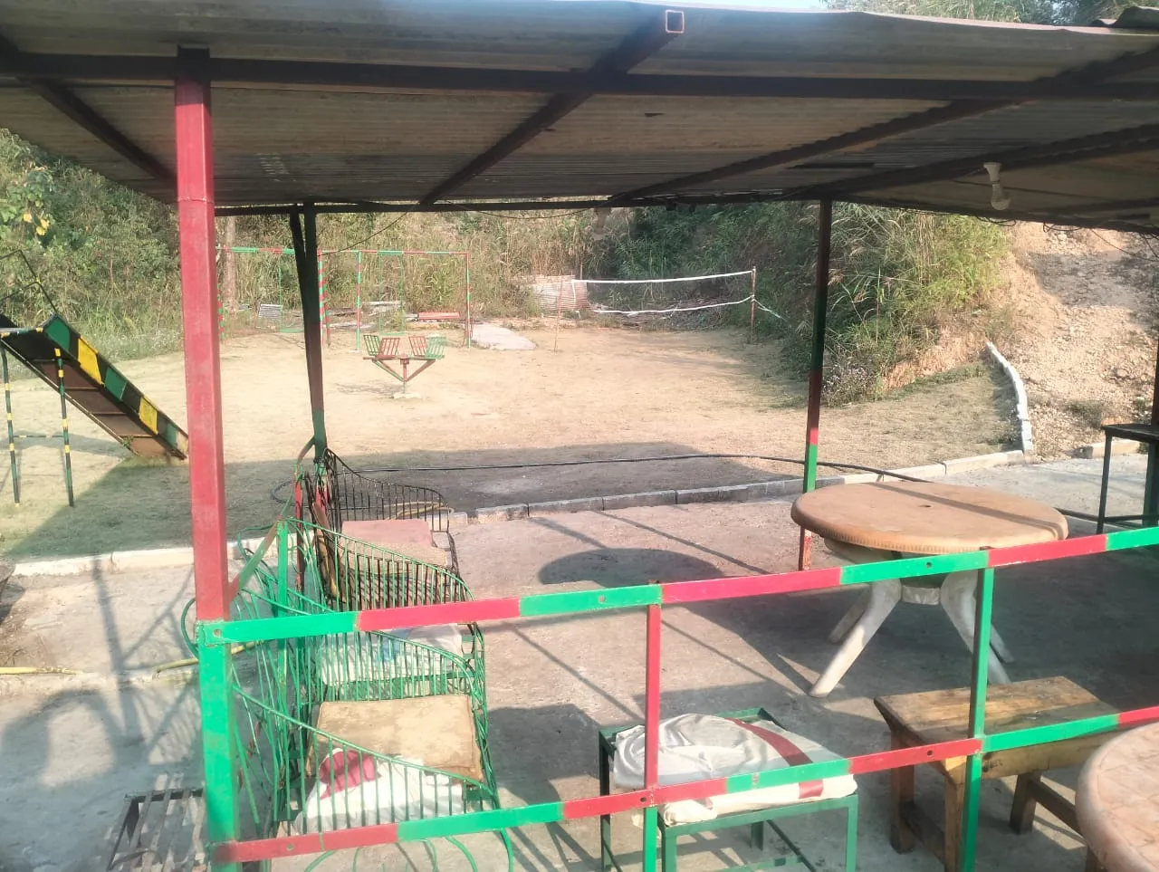Covered seating beside the play area